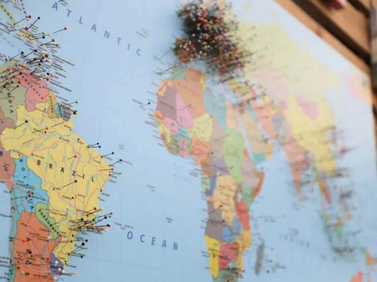 World map with pins marking global stories covered by Interworldradio.net